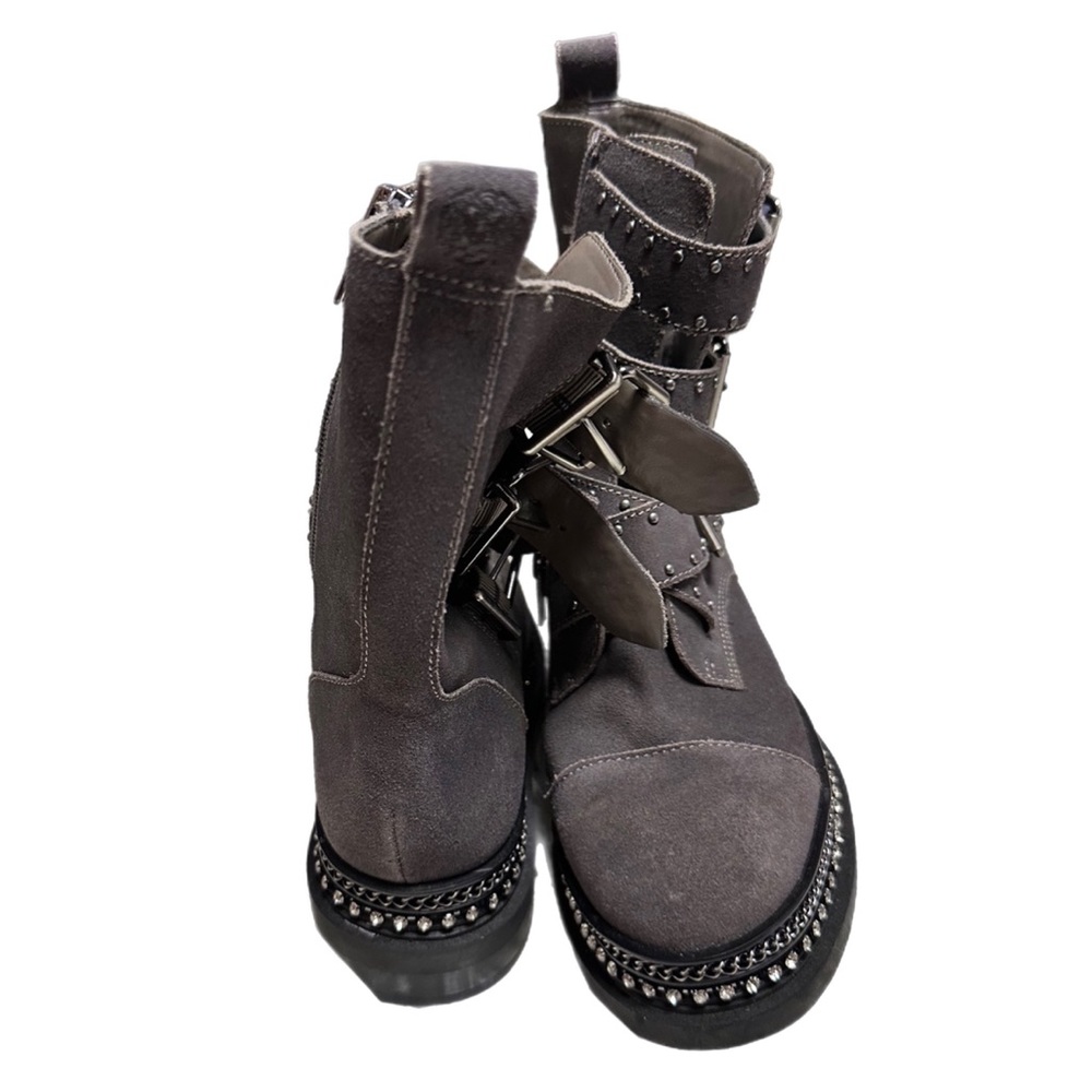 Vince Camuto, gray boot.  
More DEALS CHECK OUT MY CLOSET